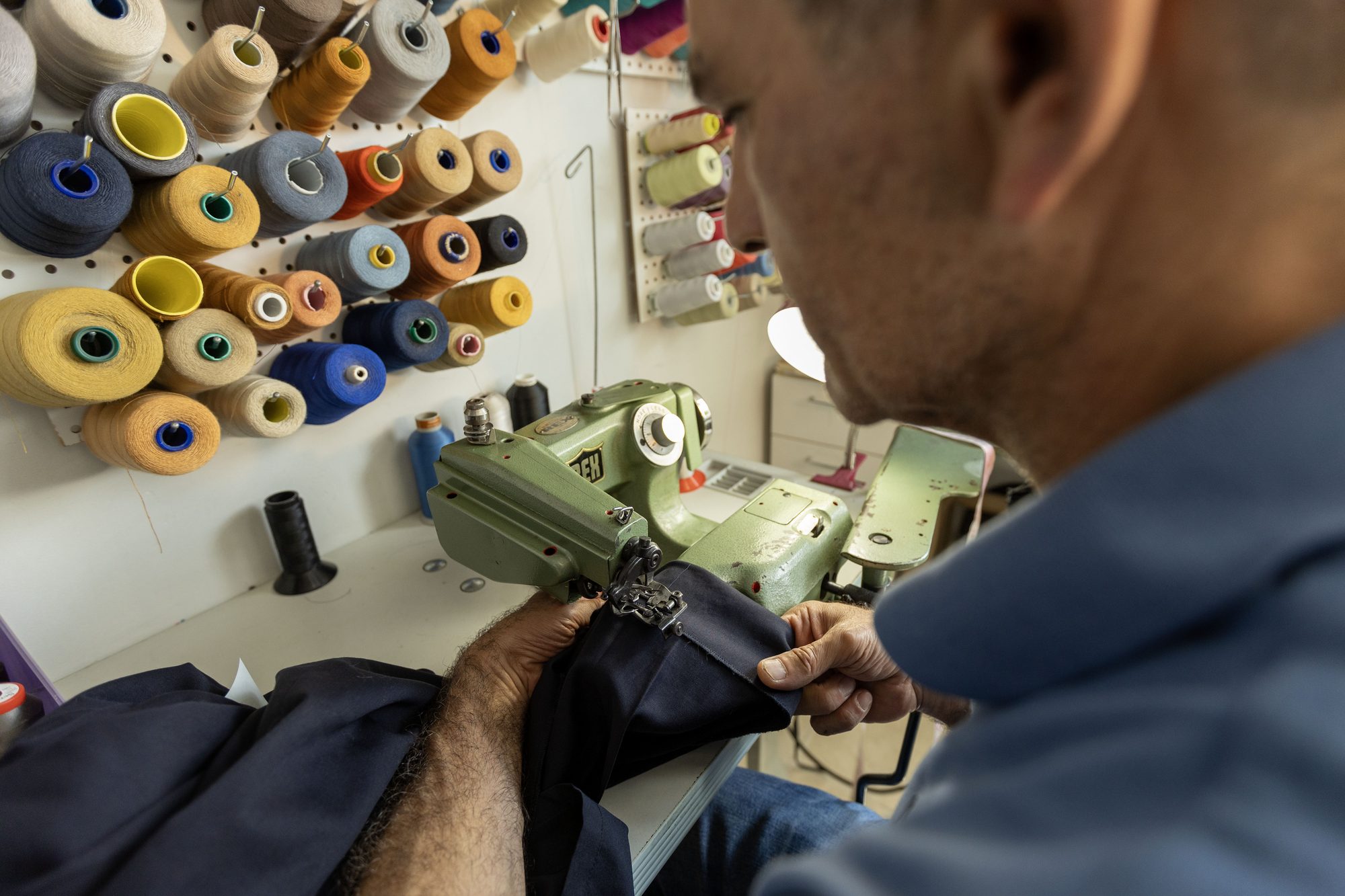 Tailoring detail with colourful thread spools